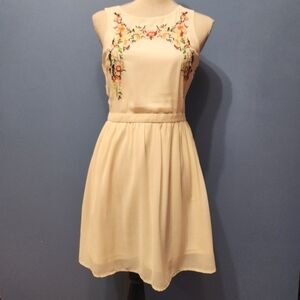 Cream dress with embroidery